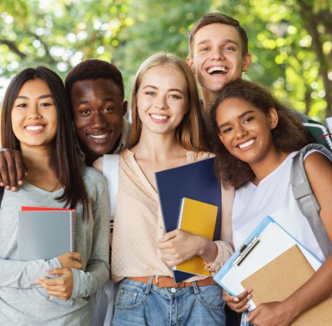 Five students smiling